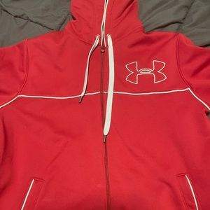 Under ARMOUR zip up jacket, barely used.  Size large